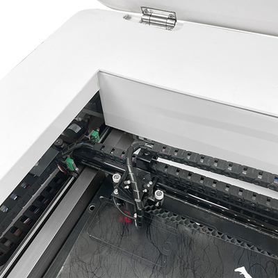 La tagliatrice del laser del protettore dello schermo di raffreddamento ad acqua per il cellulare ha temperato gli autoadesivi di vetro del computer portatile