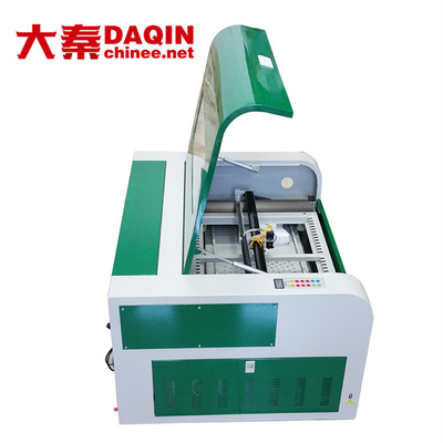 Macchina tagliata su ordinazione di vetro temperata dell'autoadesivo 30W, macchina di 30kg Daqin