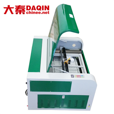 Macchina tagliata su ordinazione di vetro temperata dell'autoadesivo 30W, macchina di 30kg Daqin