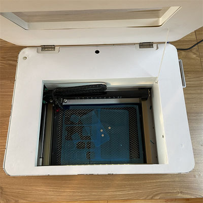 Macchina per taglio laser di protezioni schermo per ambienti interni, supportata, con peso di 40KG e formato PLT